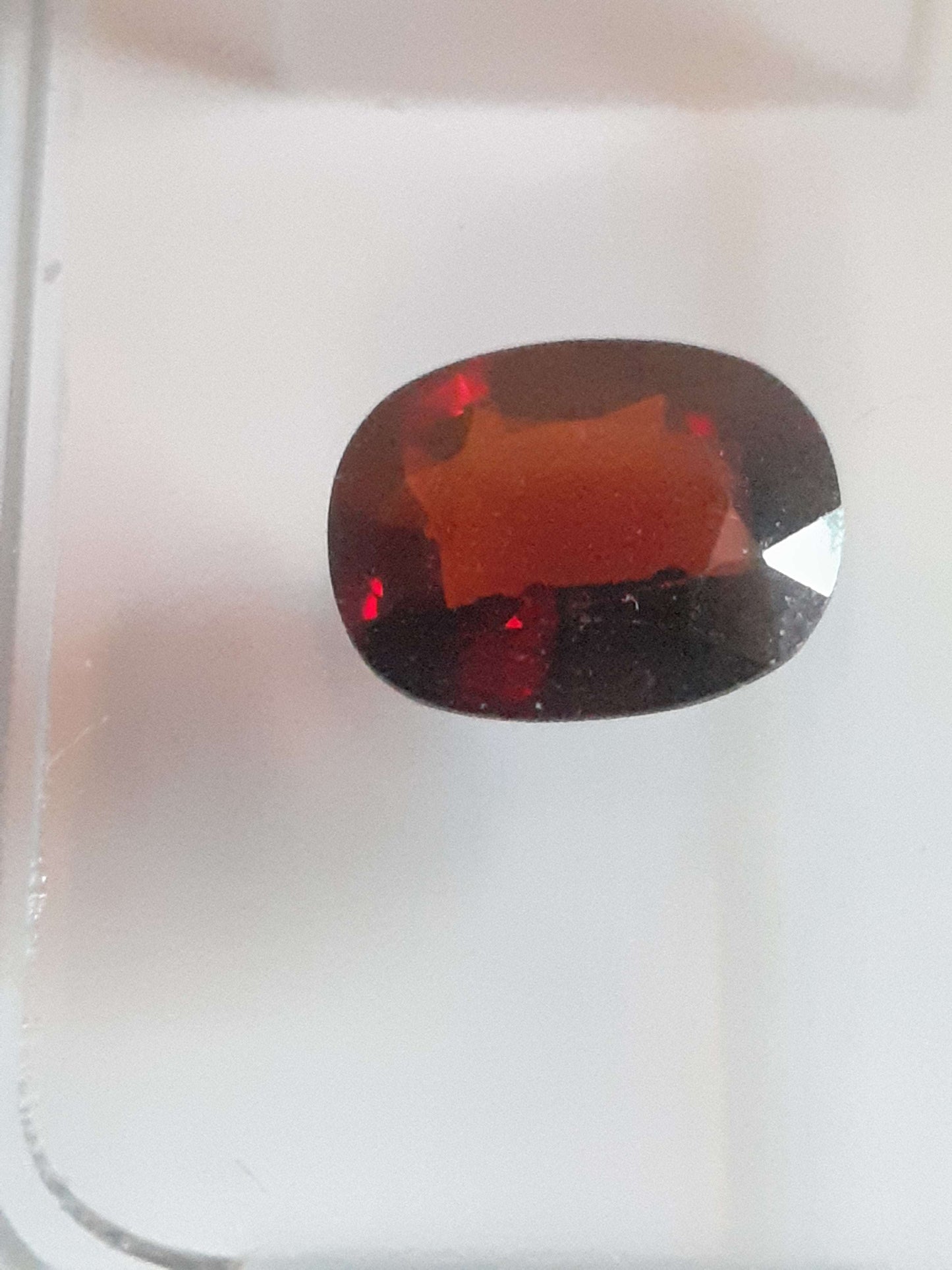 Certified orangy red Spessartite Garnet - 1.17 ct oval  - Sealed - Natural Gems Belgium