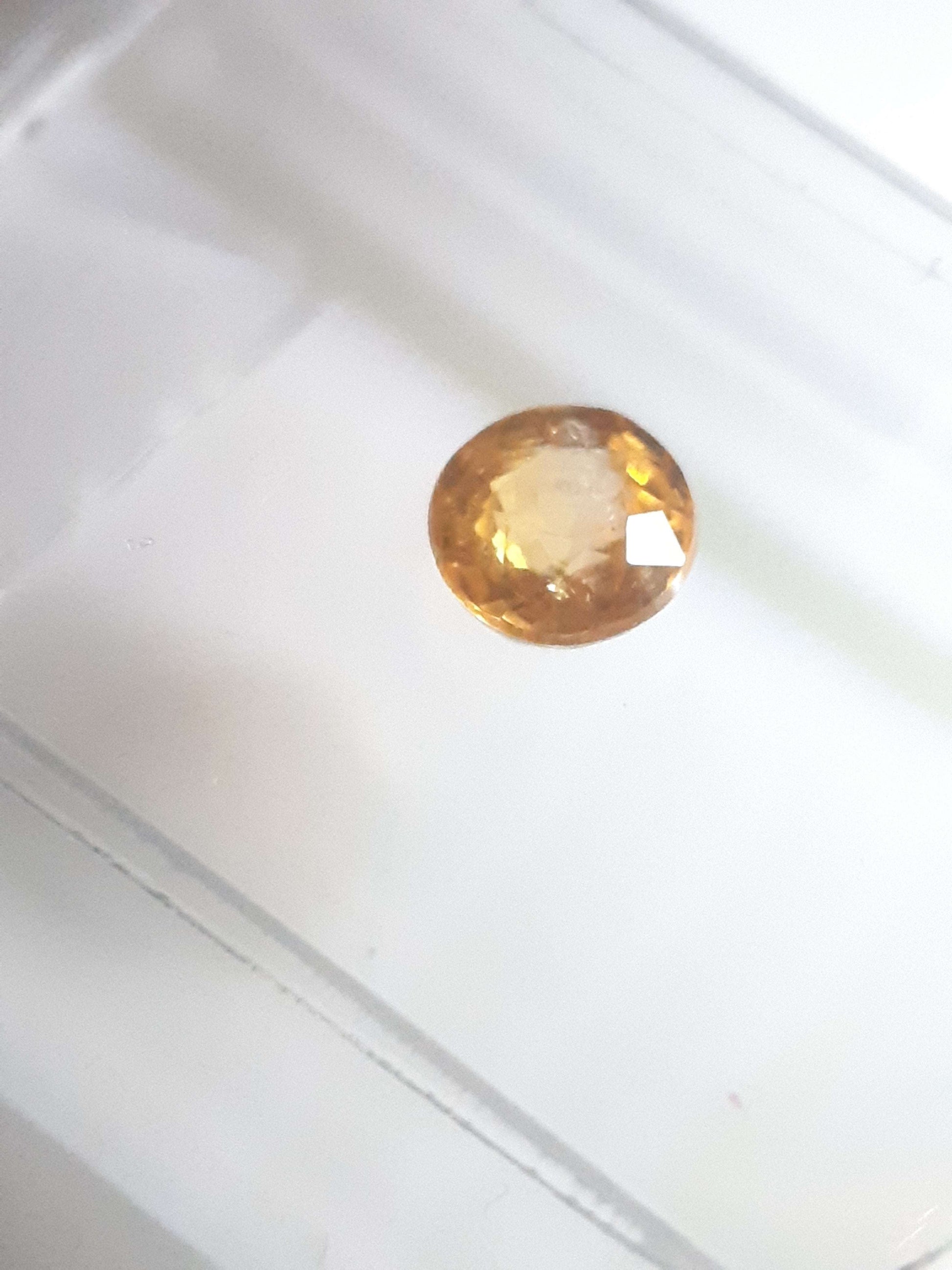 Certified round brilliant Spessartite "mandarin" Garnet - 0.40 ct - Sealed - Natural Gems Belgium