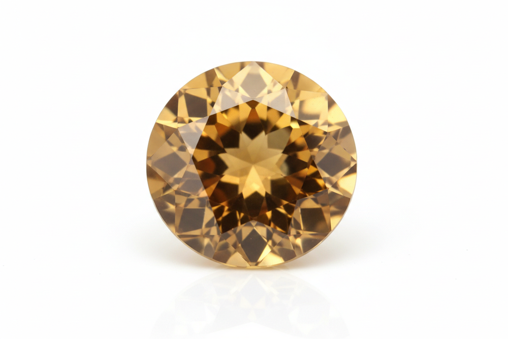 faceted Citrine gemstone Round brilliant cut white background