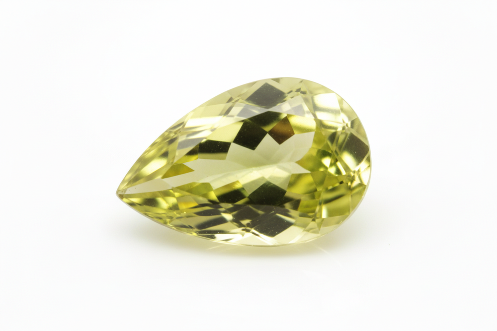 faceted lemon quartz pear shaped white background
