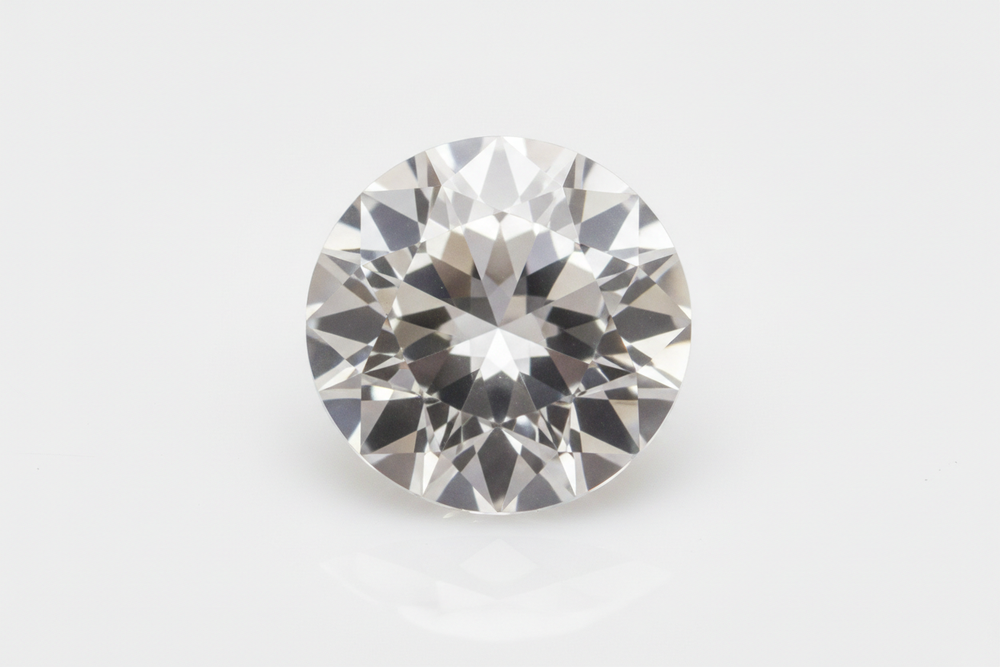 faceted pure crystal quartz round cut white background