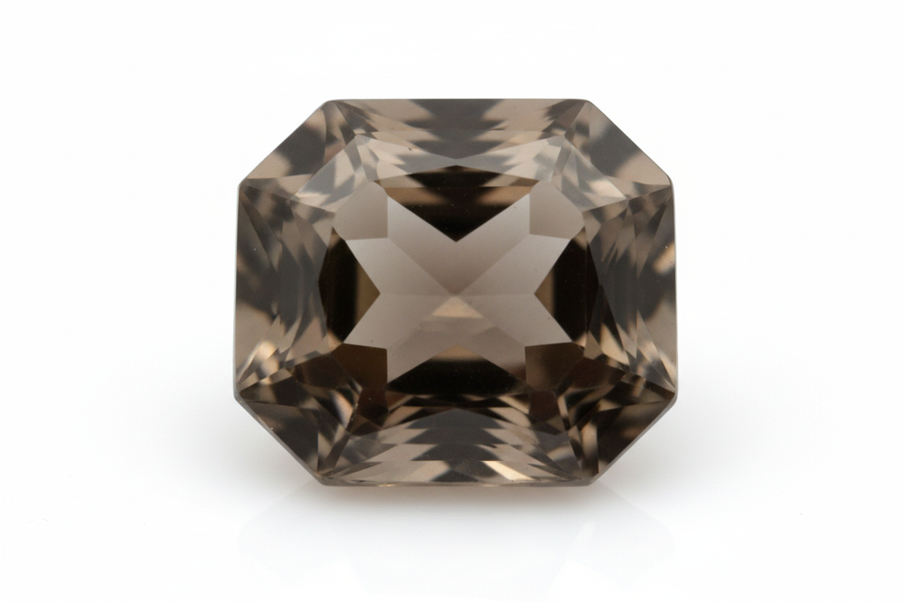faceted smoky quartz octagon cut white background