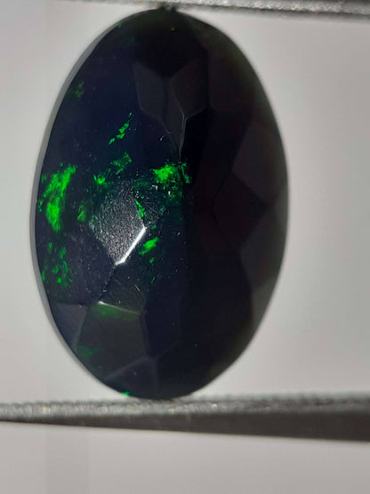 Natural Black Crystal Opal - play of color - 1.892 ct - oval - smoked