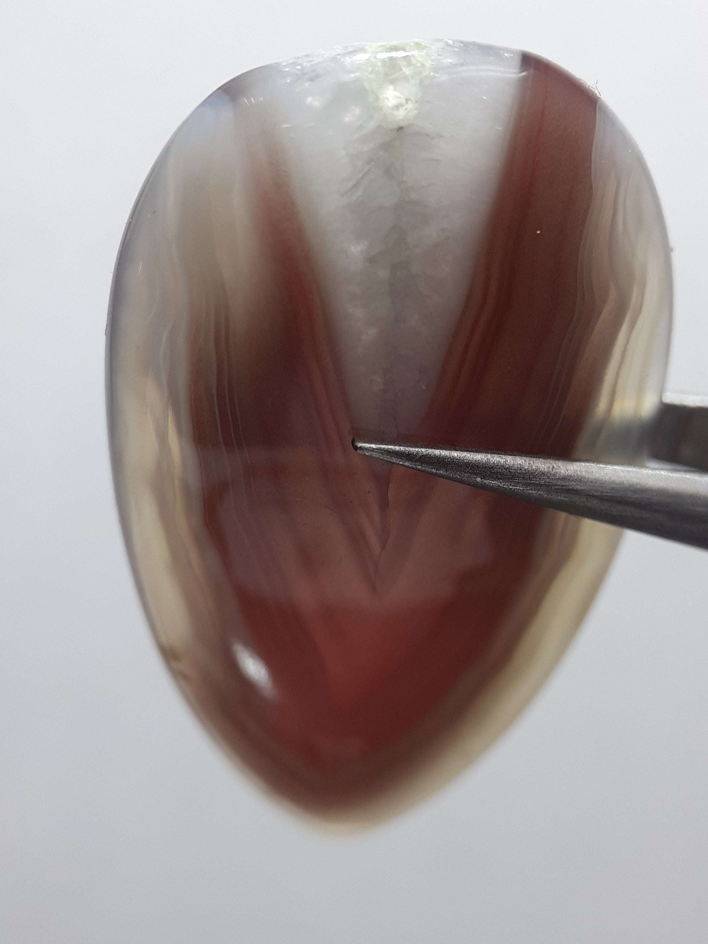 Natural brownish grey and deep orangy red Botswana Agate - 22.85 ct - Pear - crystal structure line in center