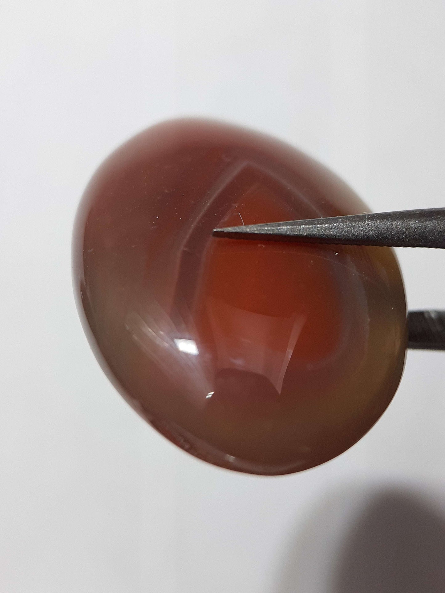 Natural brownish red Botswana Agate - 24.46 ct - oval Cabochon - unheated - certified by NGB