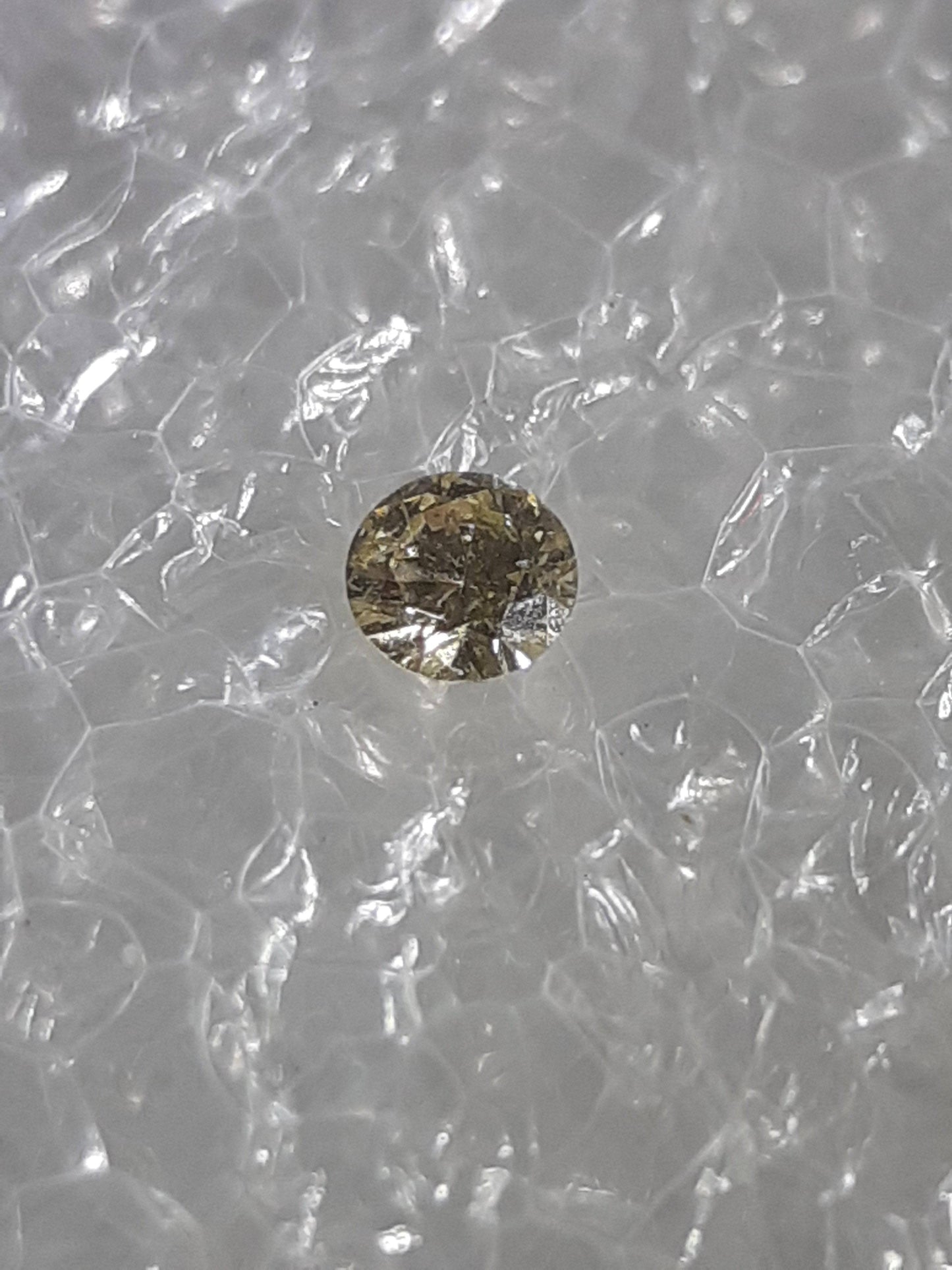 Certified Natural Diamond - Round Brilliant - 0.02ct - I1 - Light Brownish Yellow - sealed - Natural Gems Belgium