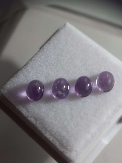 Natural light purple Amethyst - set of 4 - 1.53 tcw - oval cabochon - approx 5 x 4 mm - unheated