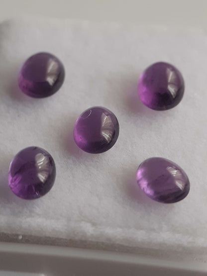 Natural medium purple Amethyst - set of 5 - 1.74 tcw - oval cabochon - approx 5 x 4 mm - unheated