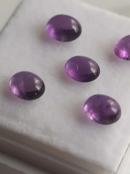 Natural medium purple Amethyst - set of 5 - 1.74 tcw - oval cabochon - approx 5 x 4 mm - unheated