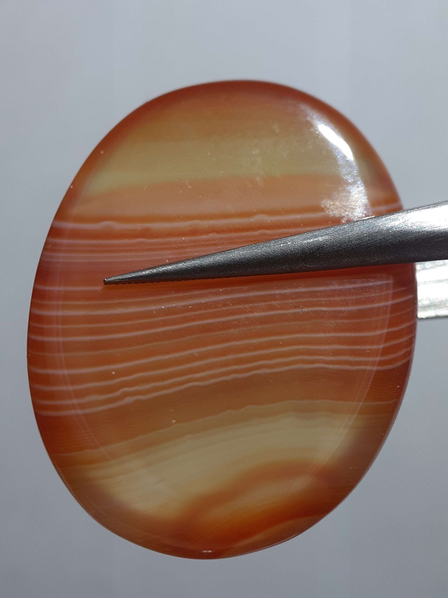 Natural orange orangy red and red Lake Superior Agate - 34.92 ct - oval Cabochon - unheated - certified by NGB