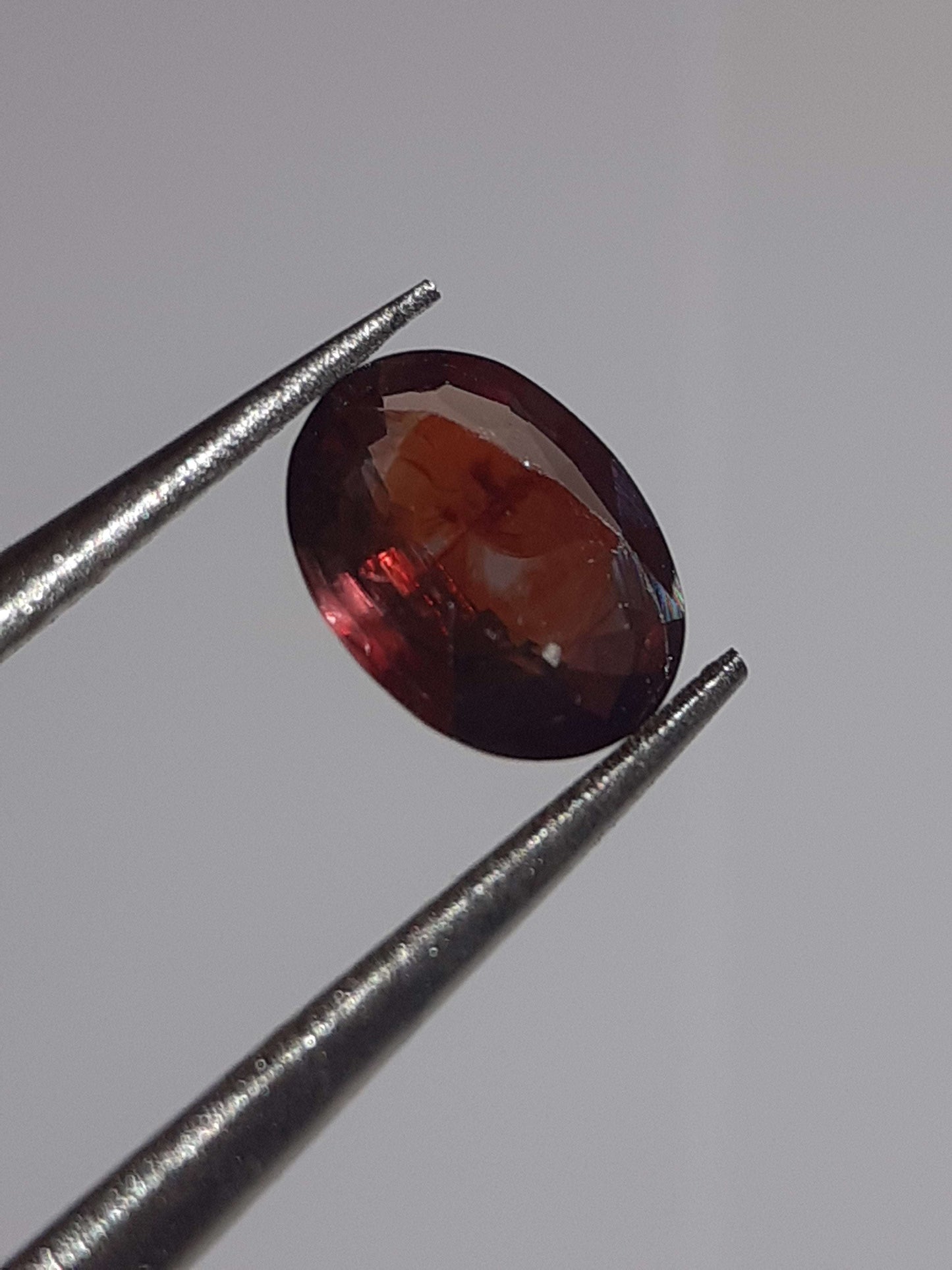 Natural orangy reddish purple Sapphire - 0.34 ct - oval - unheated - Tanzania - Certified by NGB - Natural Gems Belgium