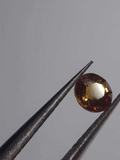 Natural orangy Yellow Sapphire - 0.34ct - round - Beryllium treated - Certified by NGB - Natural Gems Belgium