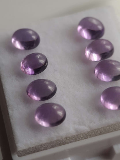 Natural purple Amethyst - set of 8 - 2.73 tcw - oval cabochon - approx 5 x 4 mm - unheated