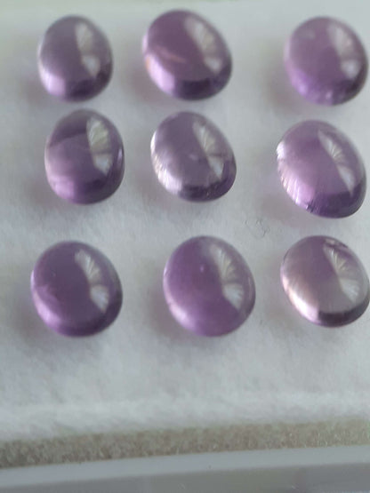 Natural purple Amethyst - set of 9 - 3.11 tcw - oval cabochon - approx 5 x 4 mm - unheated