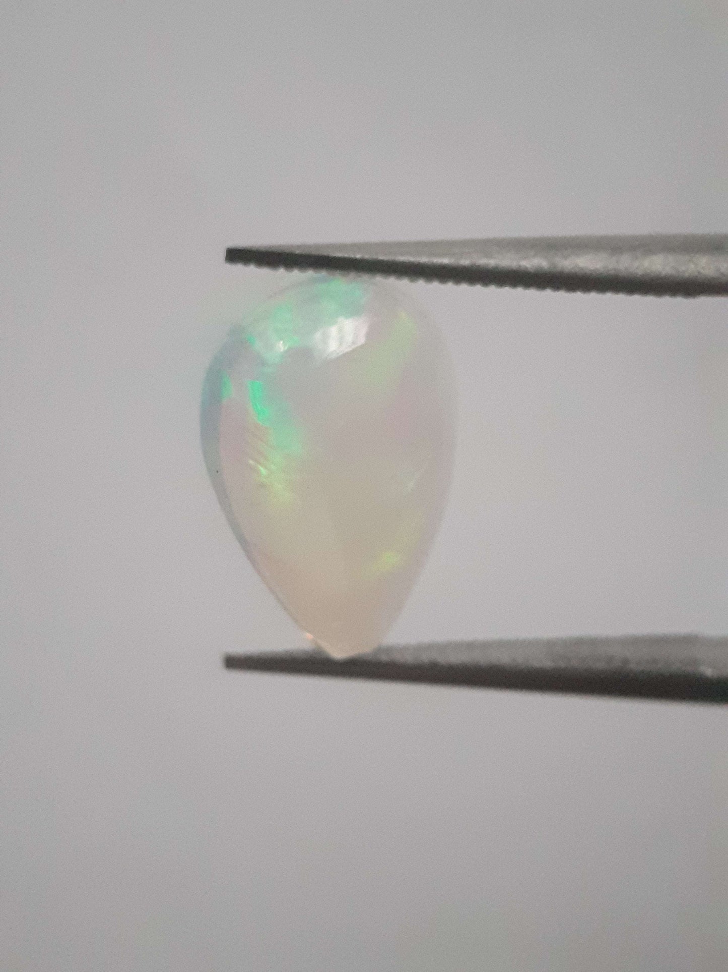 Natural Welo Opal - play of color - 1.49 ct - pear - unheated - certified by NGB