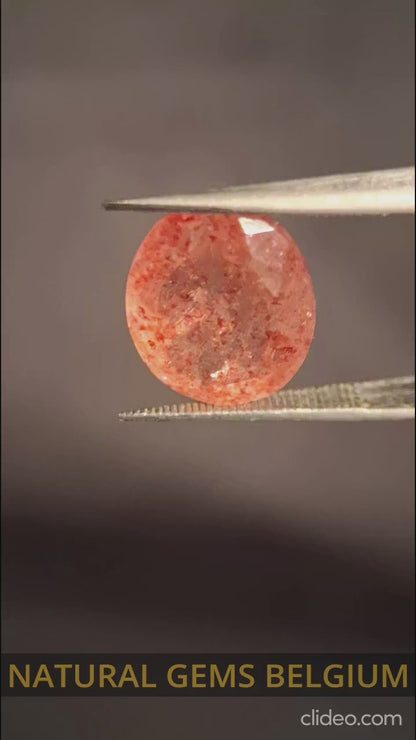 Natural orangey pink strawberry quartz - 4.453 ct - oval - Africa