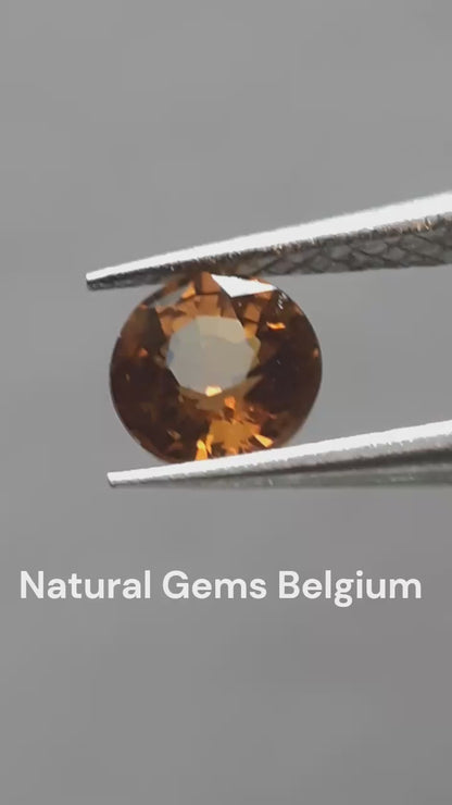 Natural orangy Yellow Sapphire - 0.34ct - round - Beryllium treated - Certified by NGB