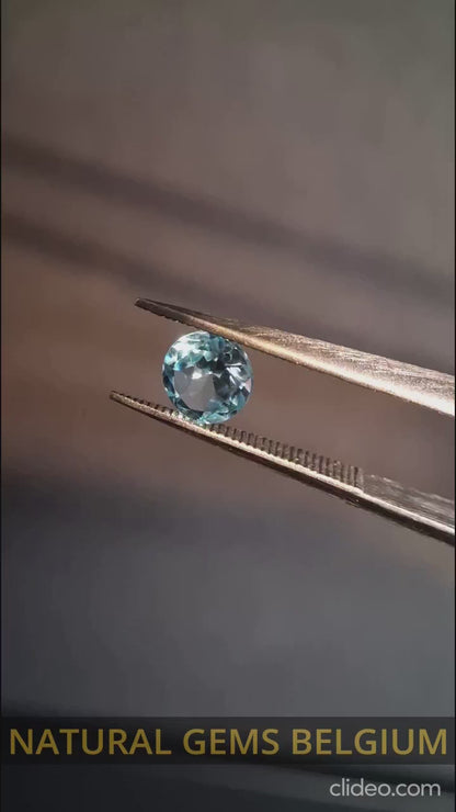 Natural Swiss Blue Topaz - 0.596 ct - round - irradiated - excellent quality - certified natural.