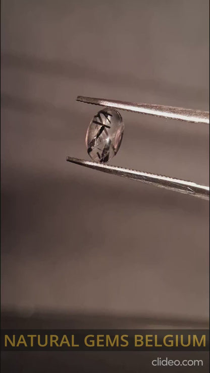 Natural Rutilated Quartz - oval cabochon - black rutile quartz - 0.475 ct