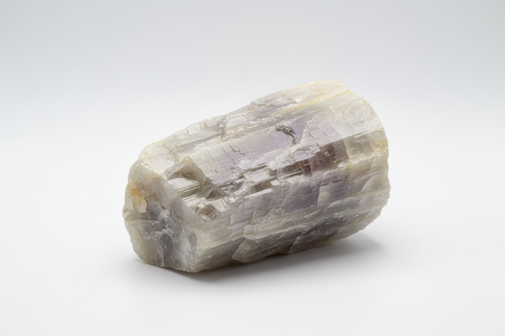 rough piece of scapolite of high quality on white background